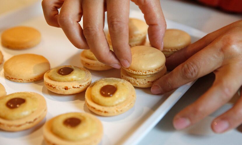 After piping the filling onto your cookie, top it with another cookie to create a sandwich.