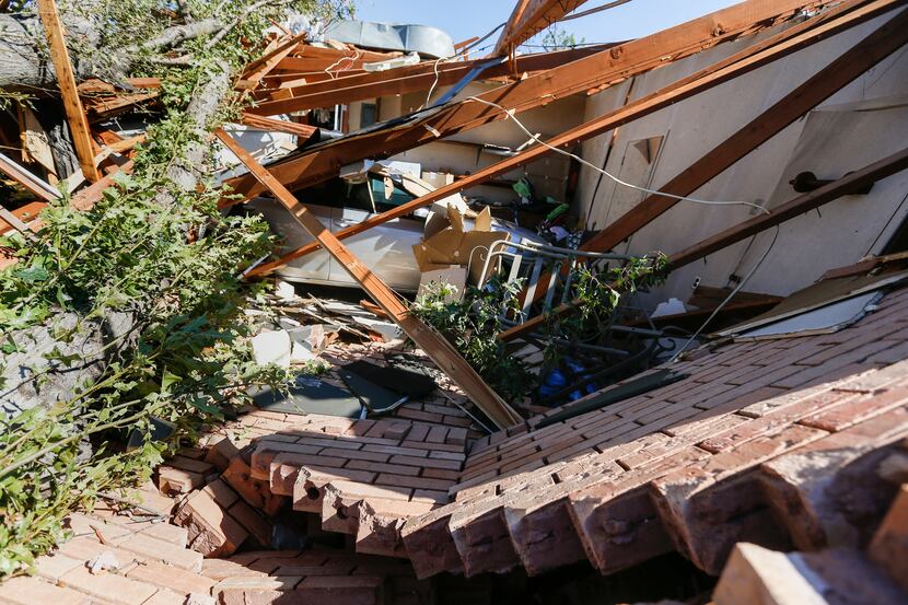 The home of Heidi Edmonds, which was destroyed when a tornado hit the night before, is seen...