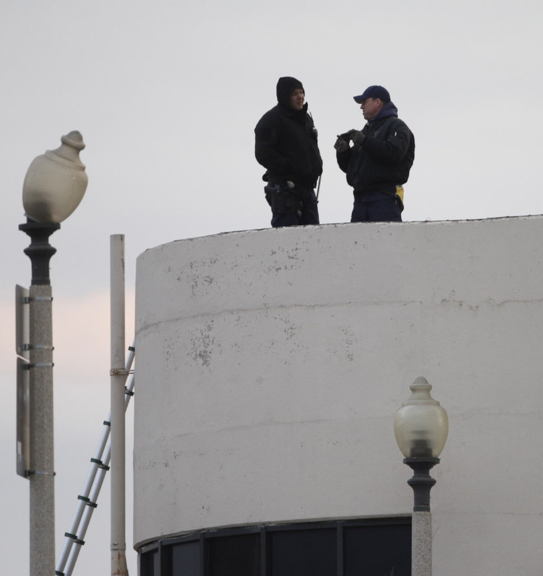 Dallas Police look out from the Reunion parking lot during the March Madness Music Festival...