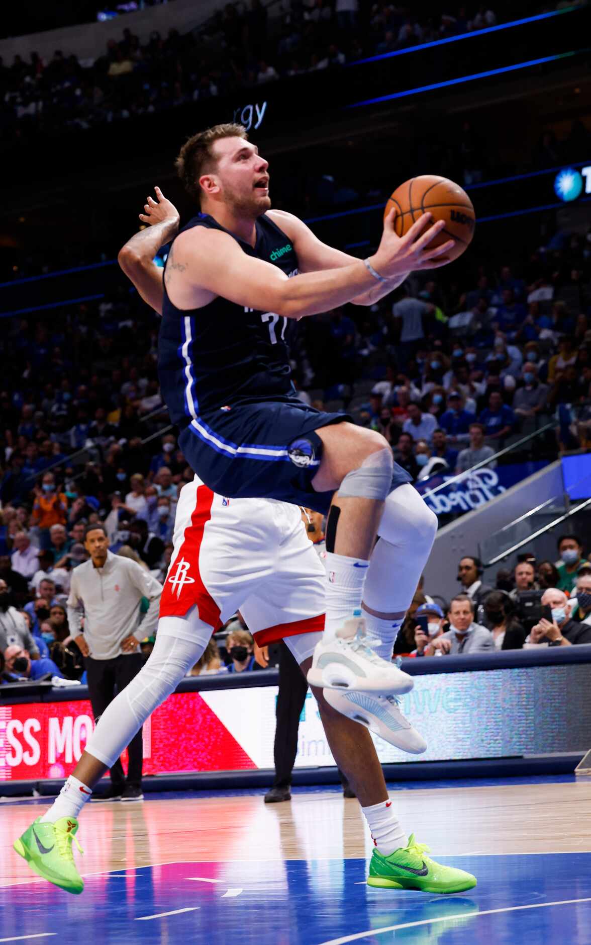 Dallas Mavericks guard Luka Dončić (77) goes up for a shot during the fourth quarter of the...