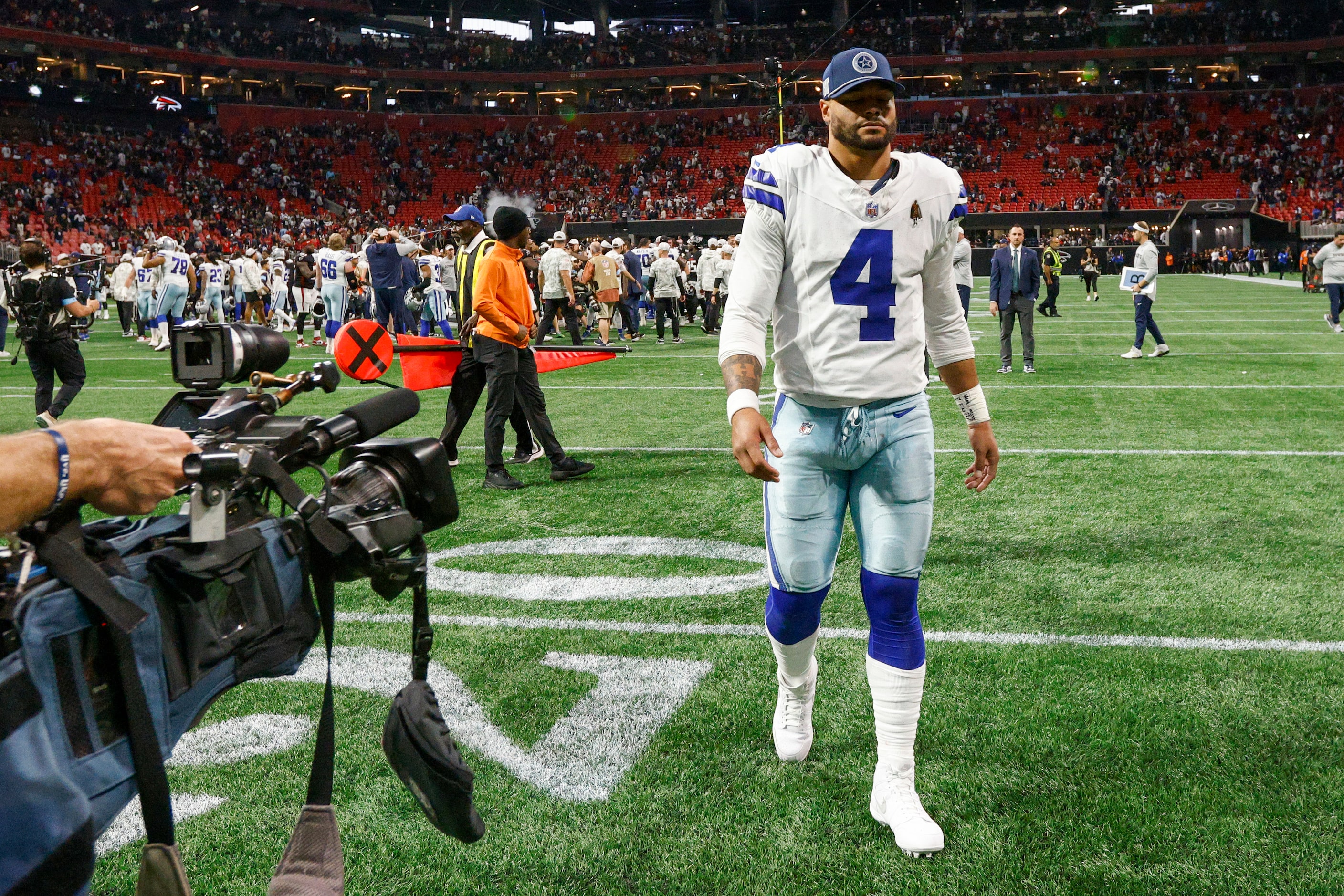 Dallas Cowboys quarterback Dak Prescott (4) walks off the field after a loss to the Atlanta...