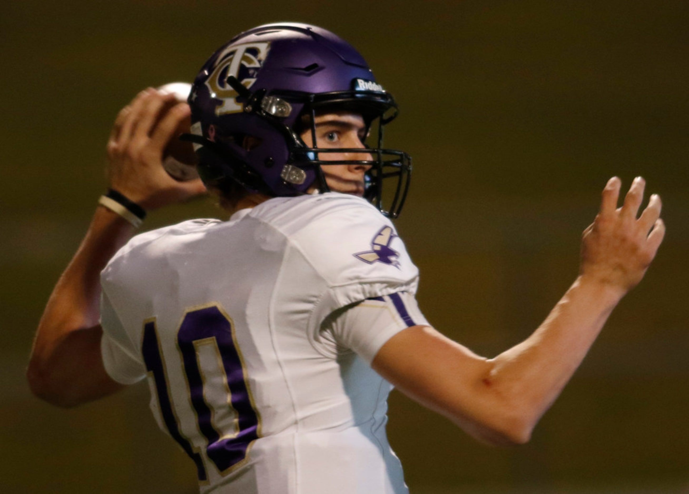 Keller Timber Creek quarterback Jason Akers (10) eyes a receiver during second quarter...