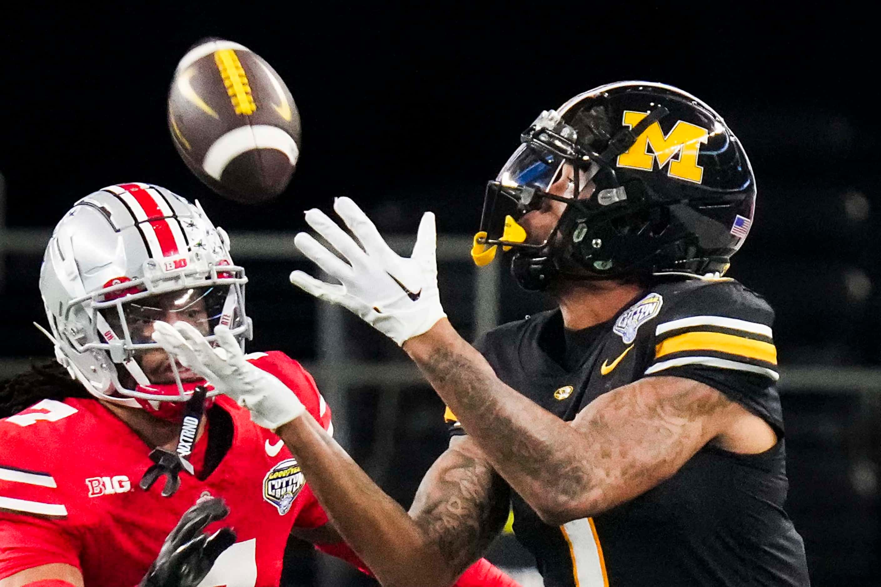 Missouri wide receiver Theo Wease Jr. (1) pulls in a long pass as Ohio State cornerback...