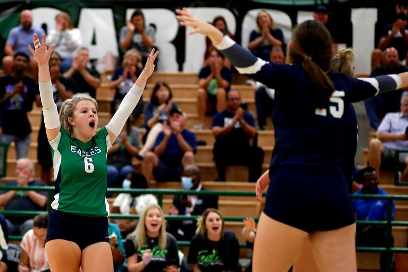 Northwest Eaton's Callie Humphrey (6) celebrates with teammates following a point during...
