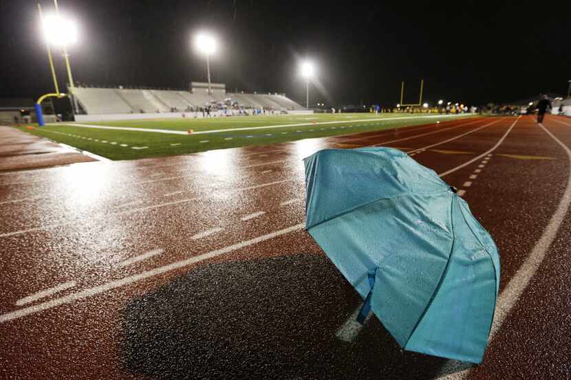 An umbrella rest on the track shortly before the start of the Garland and Garland Lakeview...