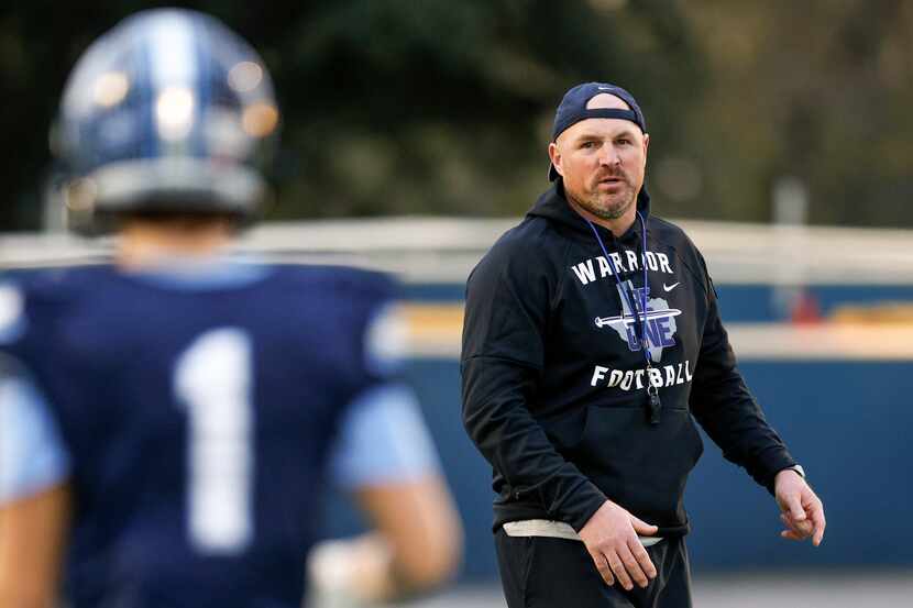 Argyle Liberty Christian head coach Jason Witten talks with his team during practice,...