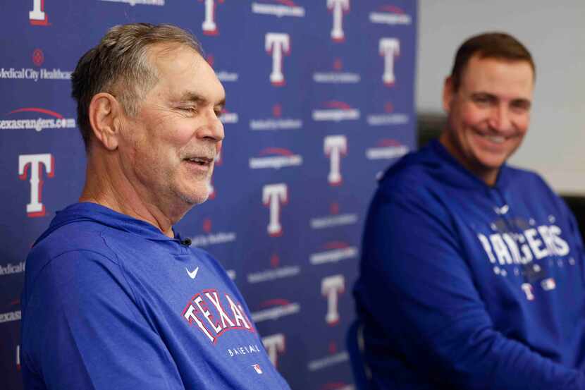 Texas Rangers manager Bruce Bochy, left, and executive vice president and general manager...