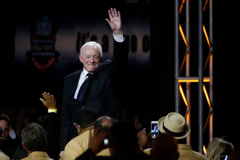 Dallas Cowboys owner Jerry Jones waves to the crowd during the Gold Jacket Dinner Ceremony...