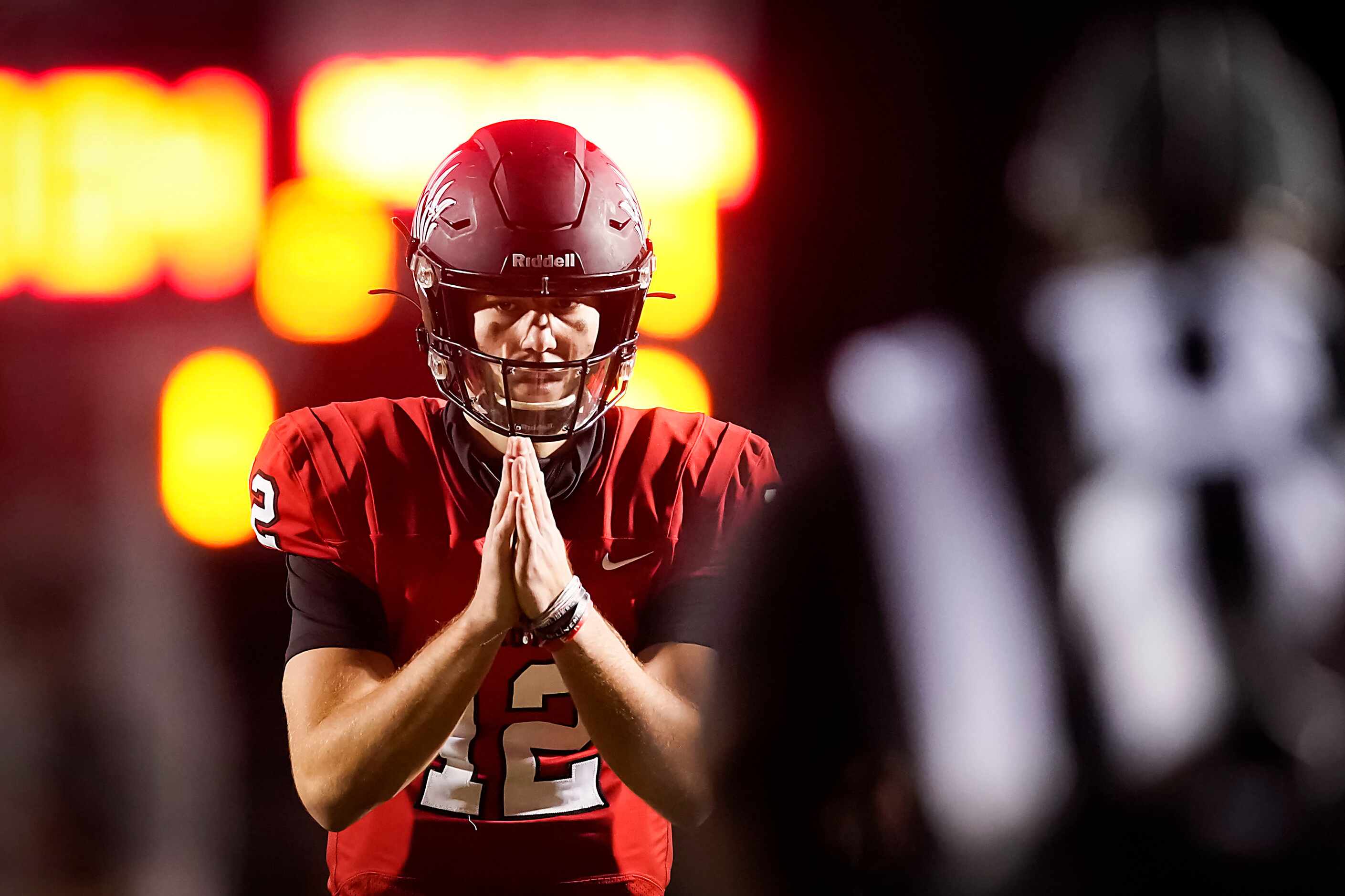 Argyle quarterback CJ Rogers waits for a snap during the first half of a high school...
