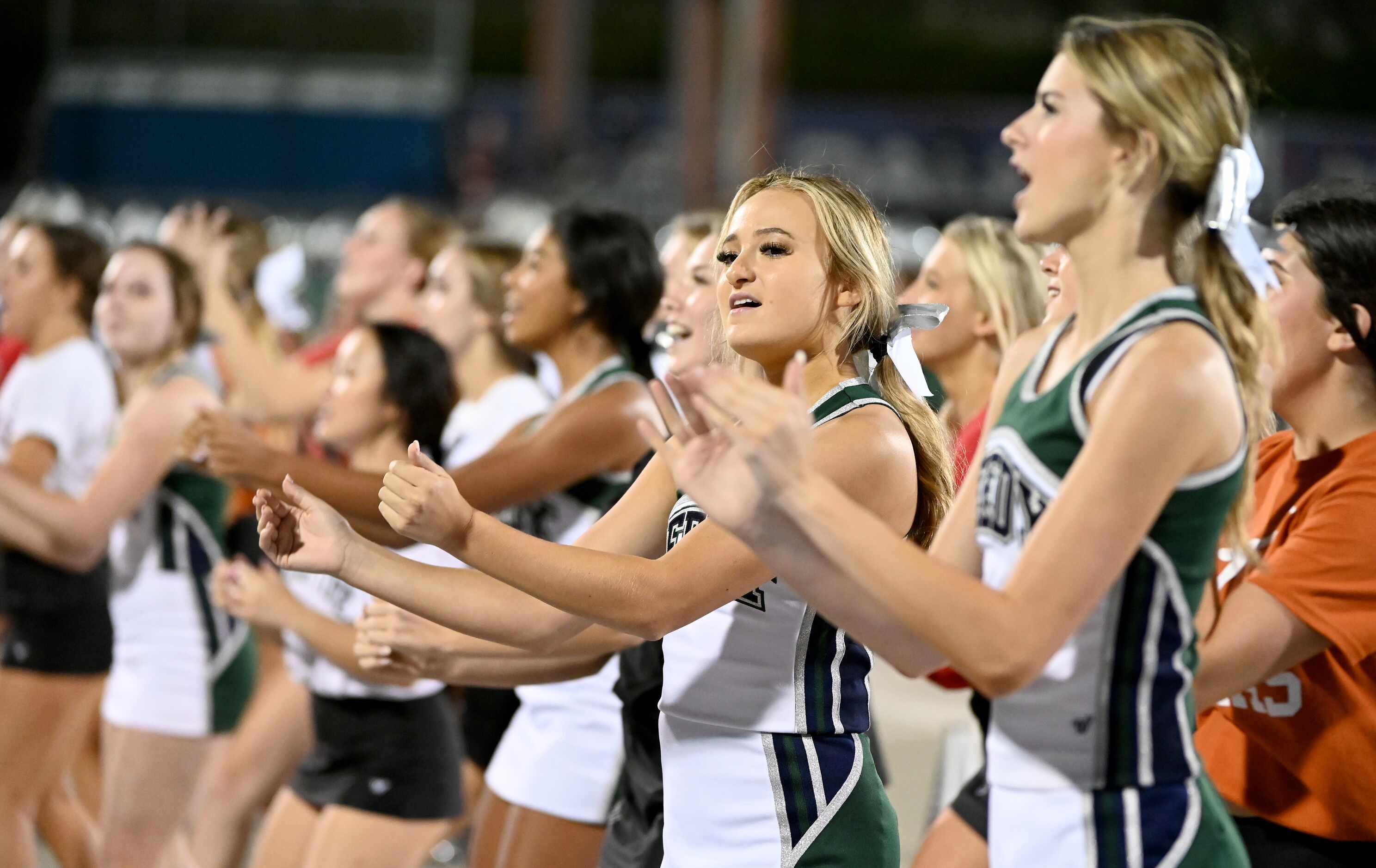 Frisco Reedy cheerleaders in the first half of a high school football game between Frisco...