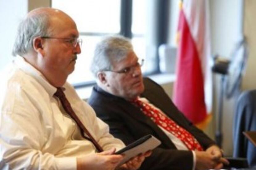  The man at left is Richard Tettamant, former administrator of the Dallas Police and Fire...