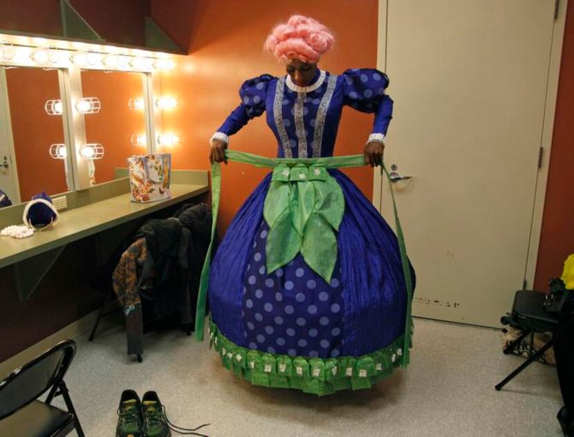 
Ivan Jones of Dallas transforms himself into Mrs. T Time as part of a British panto...