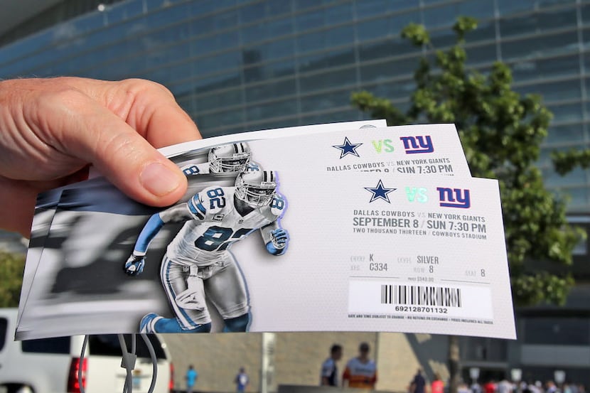 Two of the coveted season tickets to the New York Giants vs. the Dallas Cowboys NFL football...