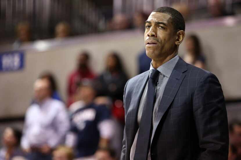 UConn coach Kevin Ollie stares after an SMU basket during the first half of an NCAA...