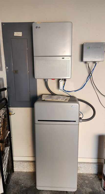 Tom Seng's battery backup for his solar panel system (bottom). A fuse box (left), electric...