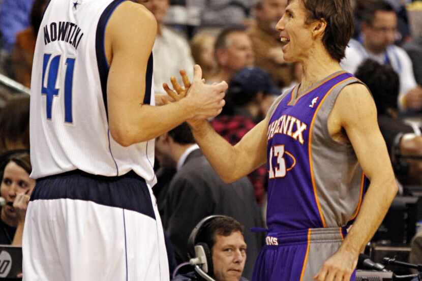 Dallas Mavericks power forward Dirk Nowitzki (41) and Phoenix Suns point guard Steve Nash...