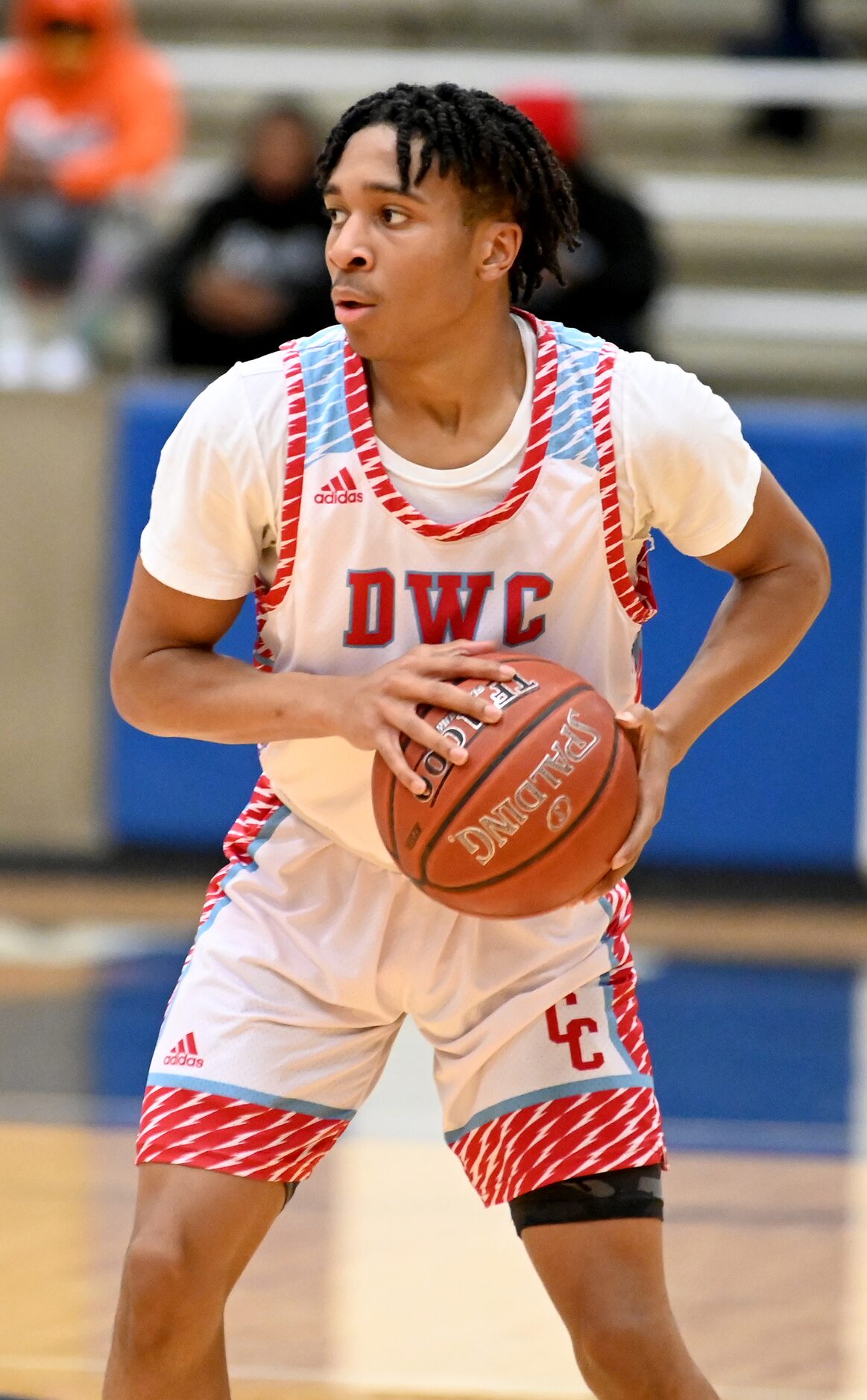 Carter’s Hamilton Hamm holds the ball in the second half during a Class 4A Region II final...