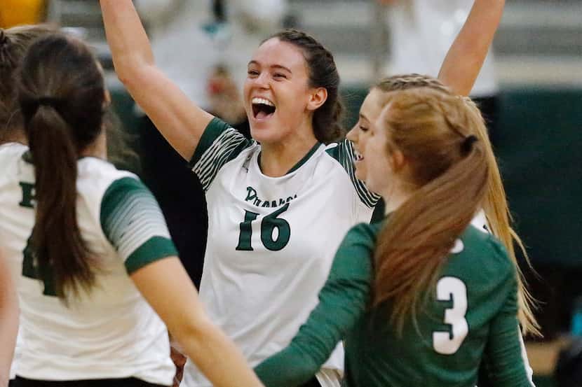 Prosper High School setter Madi Whitmire (16) celebrates a point during game three as...