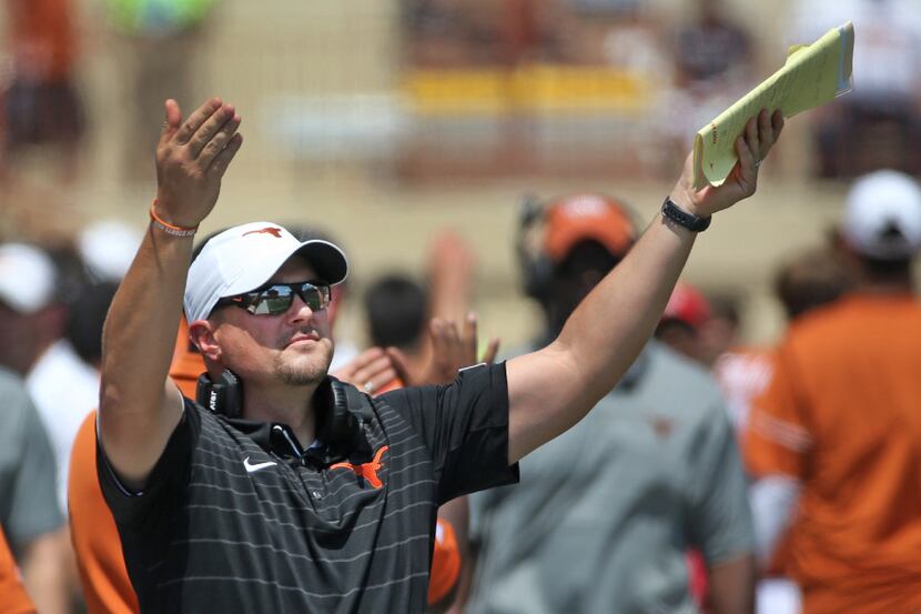Texas head coach Tom Herman gestures to an official in the third quarter during the...
