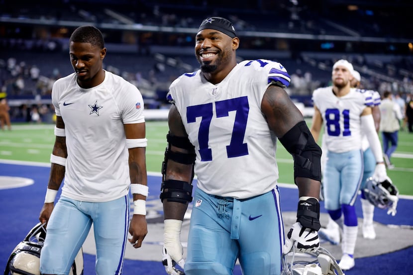 Dallas Cowboys offensive tackle Tyron Smith (77) is all smiles after their win over the...