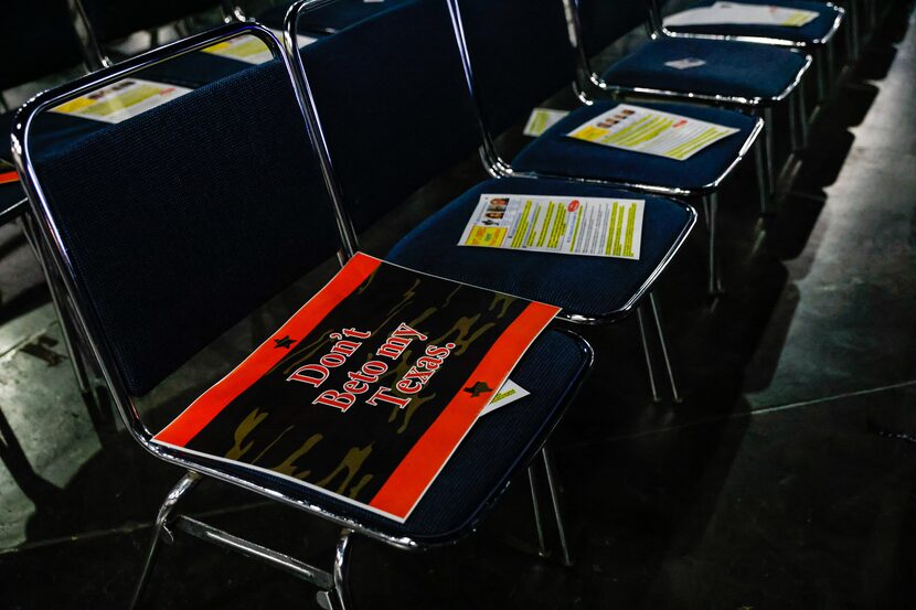 A signs reads "Don't Beto my Texas" lies on a sit at the 2022 Republican Party of Texas...