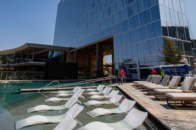 A water and pool deck seating area at Live! by Loews Hotel in Arlington.