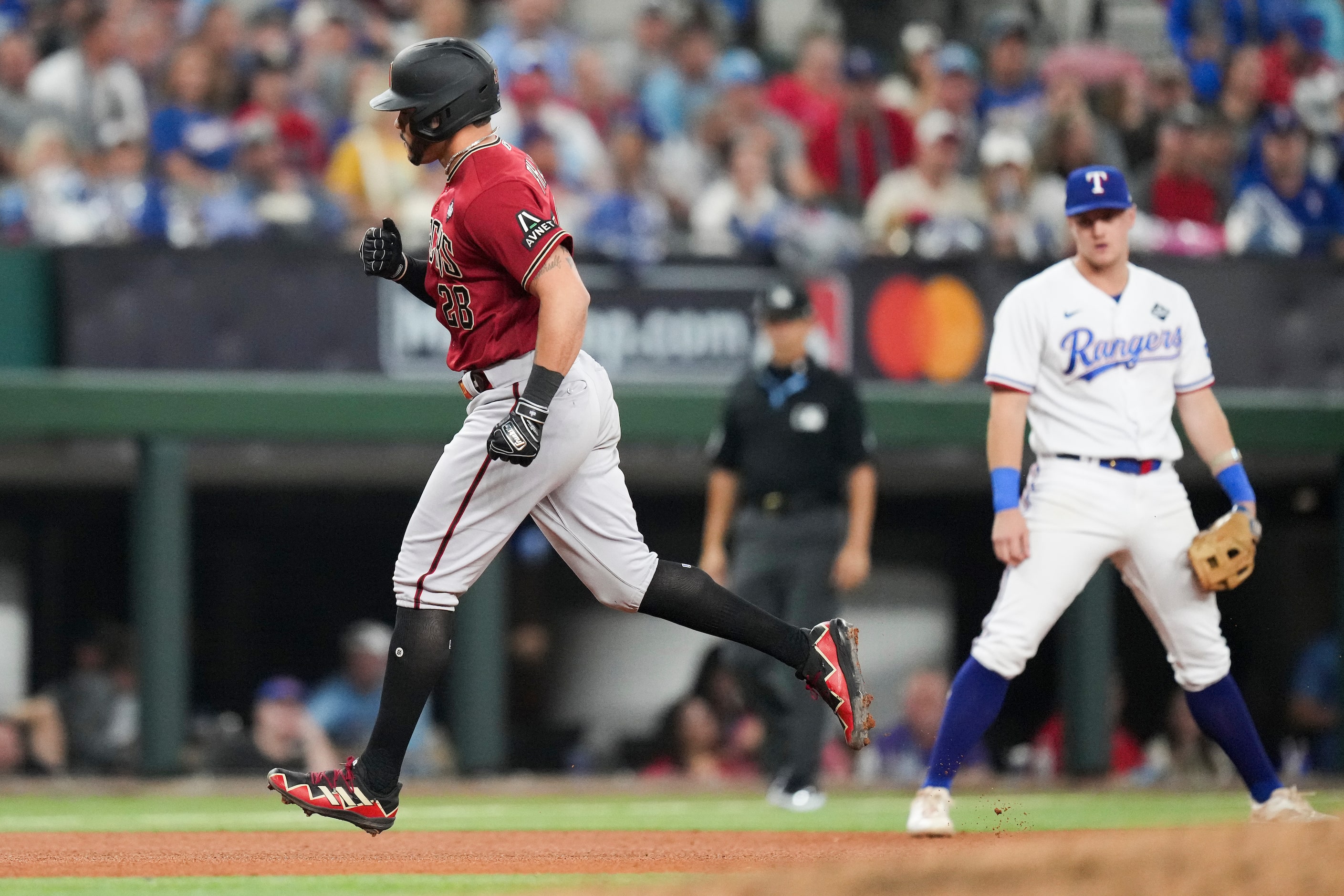 Arizona Diamondbacks' Tommy Pham runs the bases after hitting a solo home run during the...