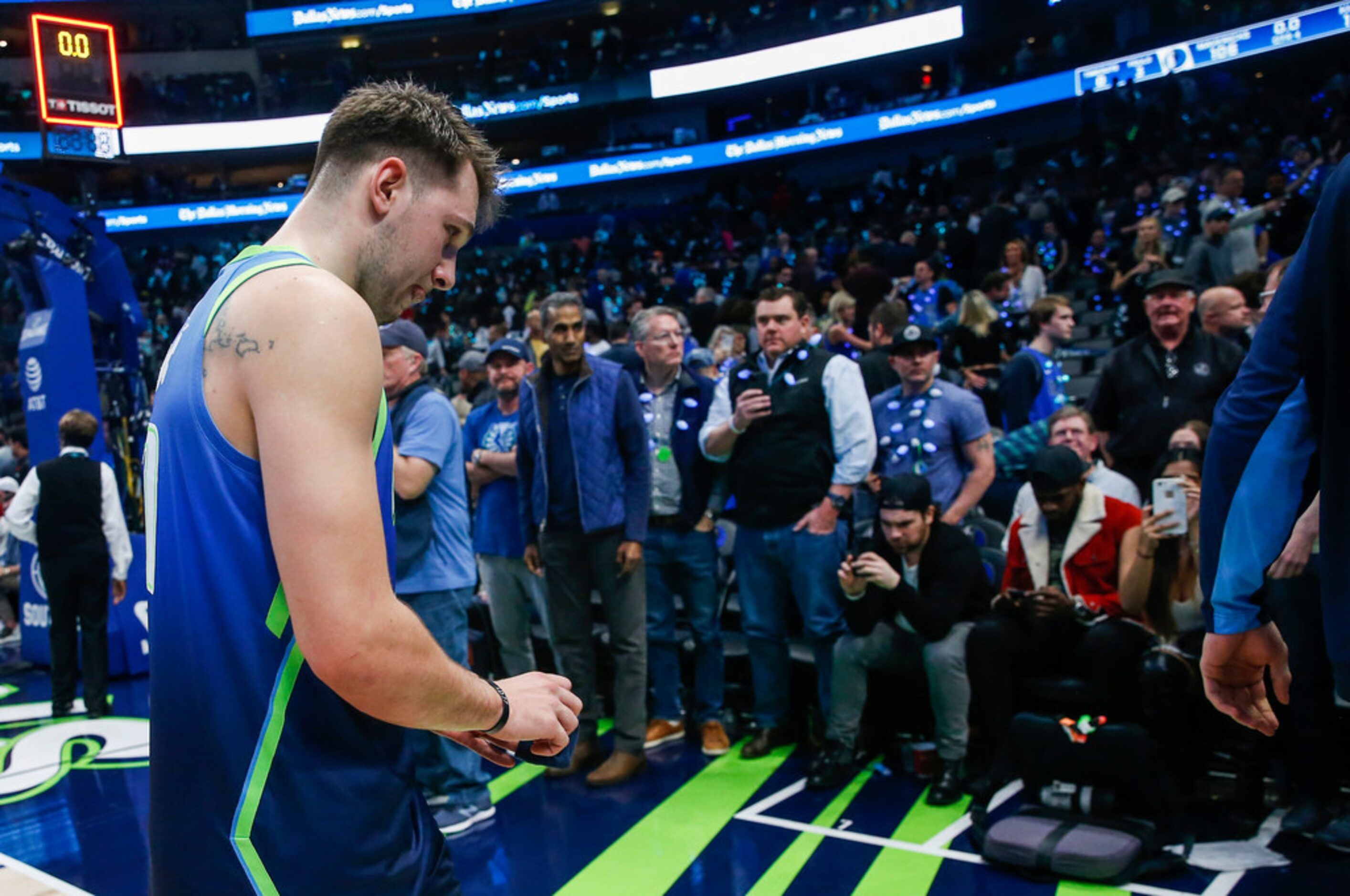 Dallas Mavericks forward Luka Doncic (77) exits the court following a loss to the Sacramento...