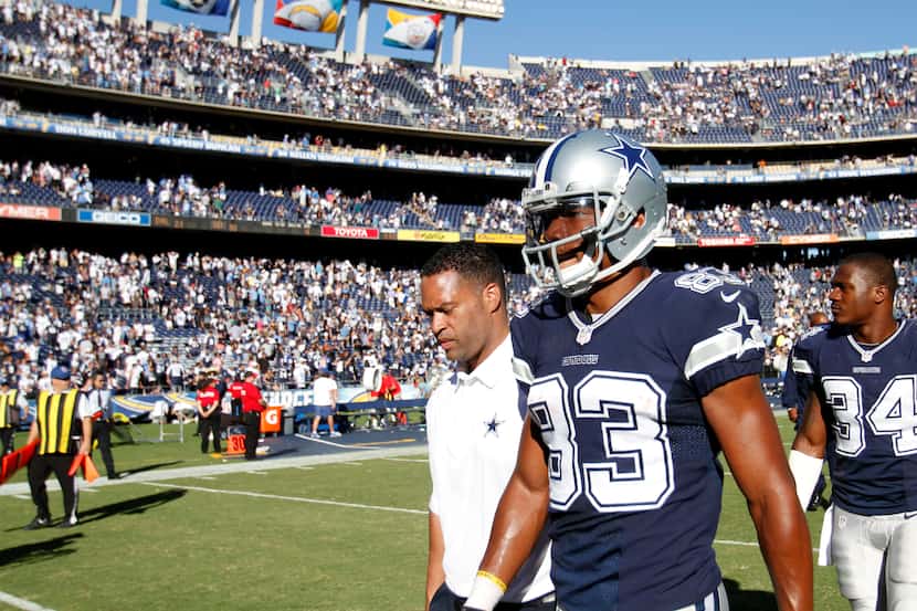 Dallas Cowboys wide receiver Terrance Williams (83) makes his way off the field after losing...