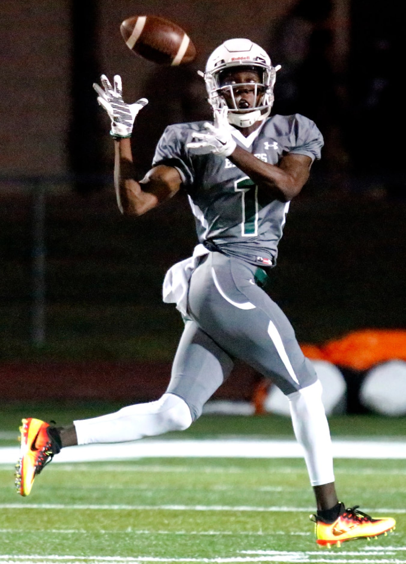 Prosper High School wide receiver Everett Jefferson (1) gets behind the McKinney North...