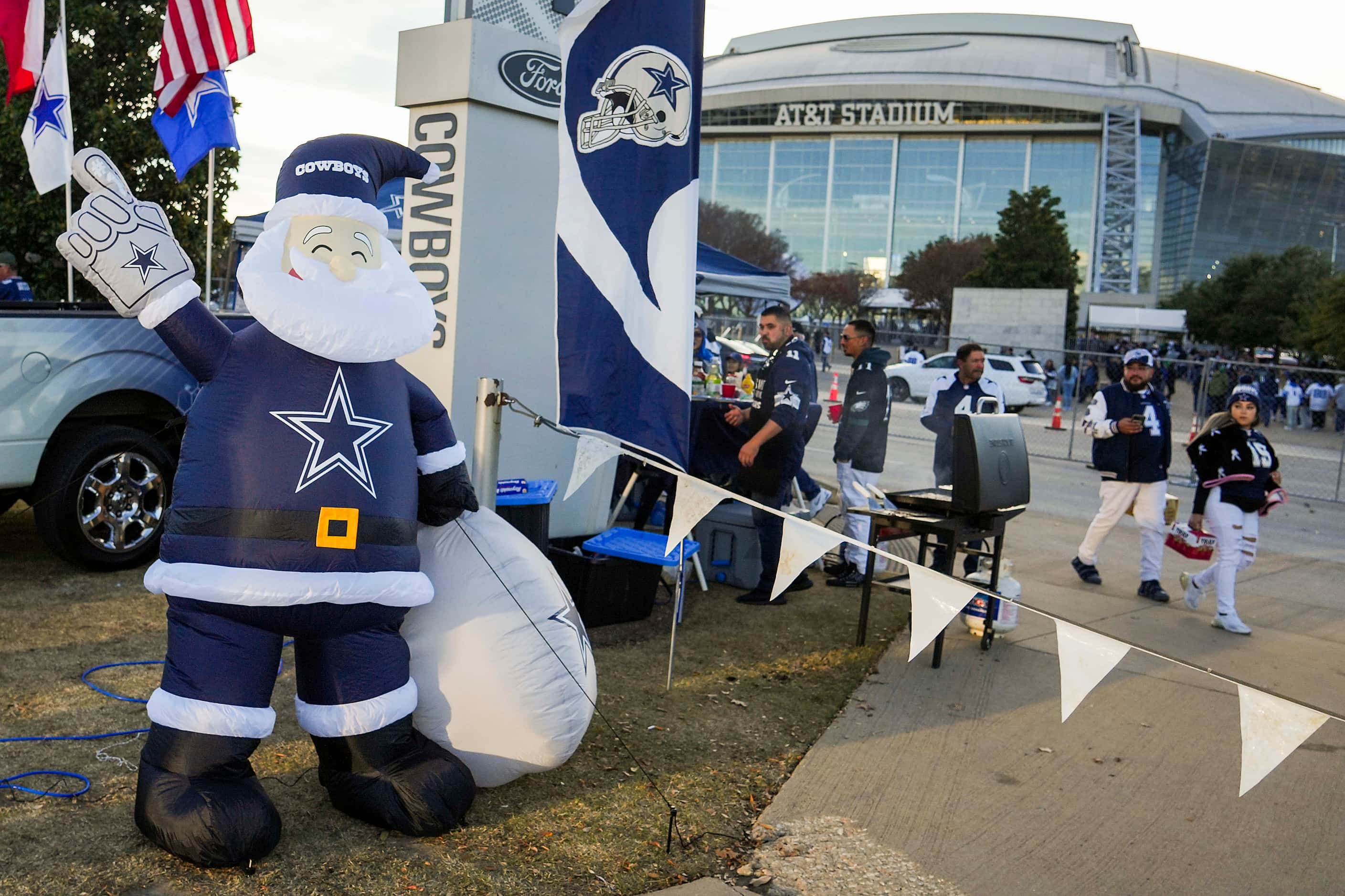 Fans tailgate before an NFL football game between the Dallas Cowboys and the Philadelphia...
