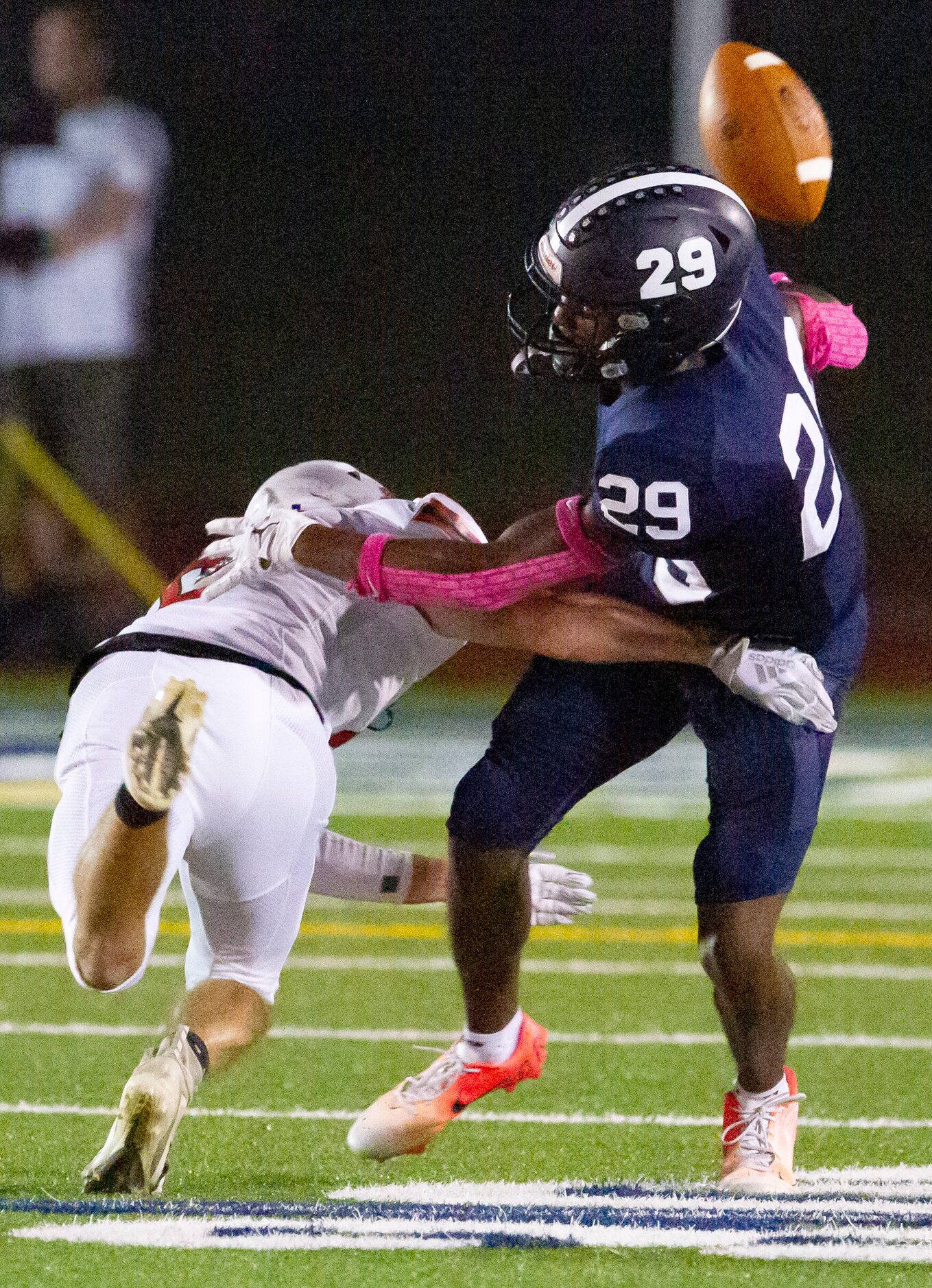 Houston St. Johns junior defensive back Jack McGarry (6), left, hits Episcopal School of...