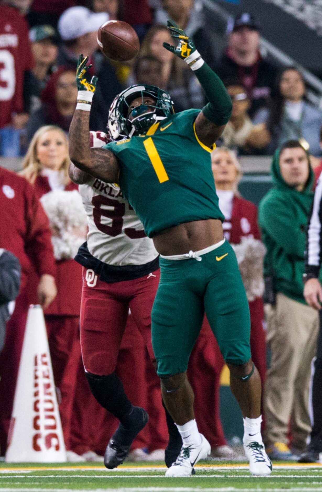 Baylor Bears cornerback Grayland Arnold (1) intercepts a pass intended for Oklahoma Sooners...