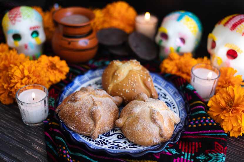 Mexican bread on Altar with sugar skull and hot chocolate traditional food for Celebration...