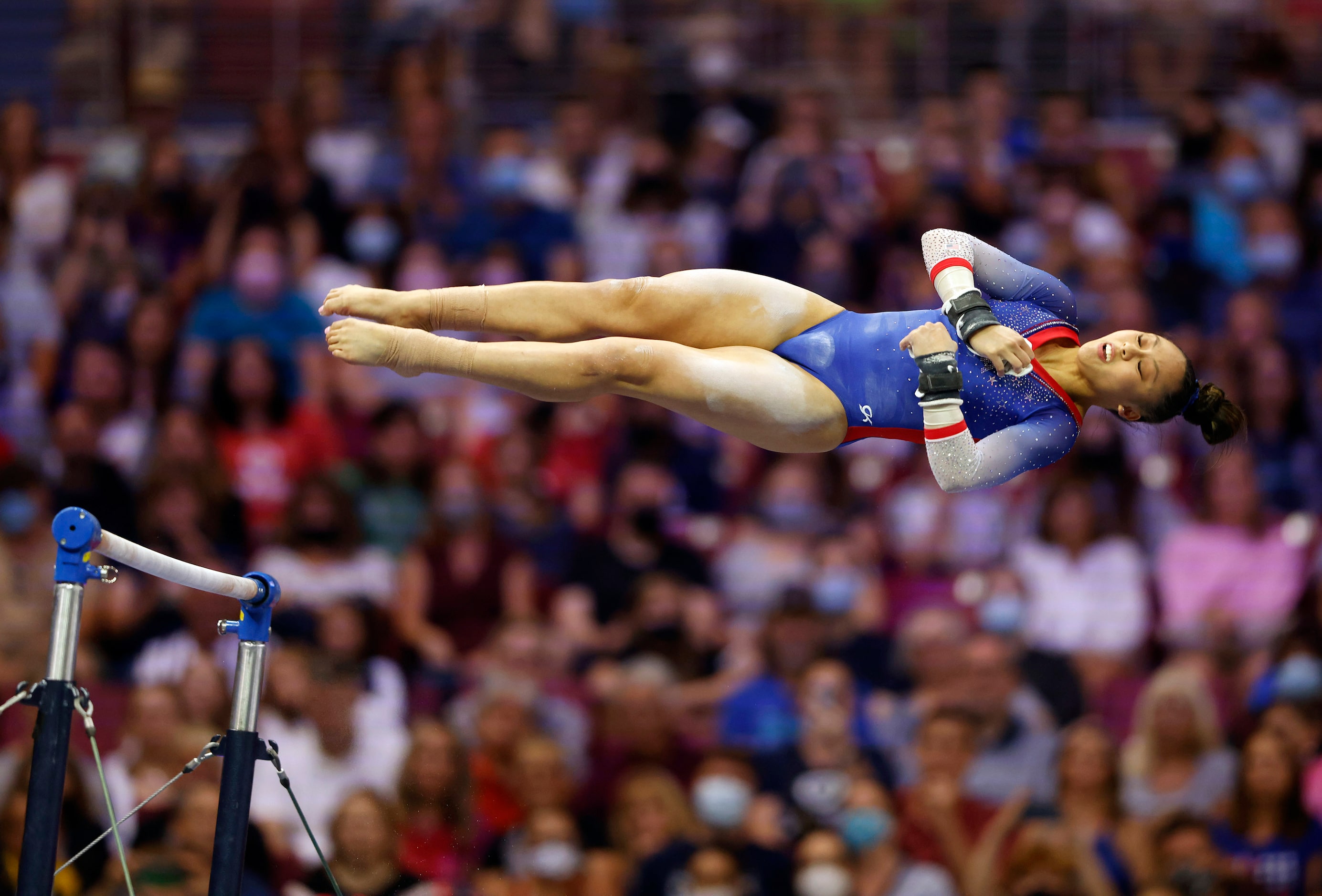 Emma Malabuyo of Texas Dreams competes in the uneven bars during day 1 of the women's 2021...