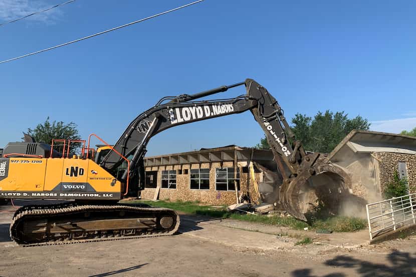 The Han Gil Hotel in northwest Dallas was torn down Tuesday, June 2, 2020 after serving as a...
