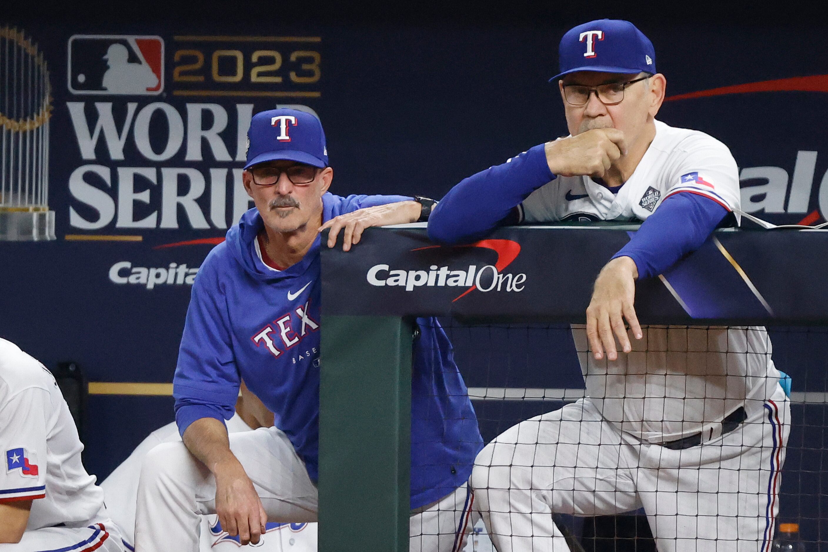 Texas Rangers pitching coach Mike Maddux and manager Bruce Bochy watch starting pitcher...