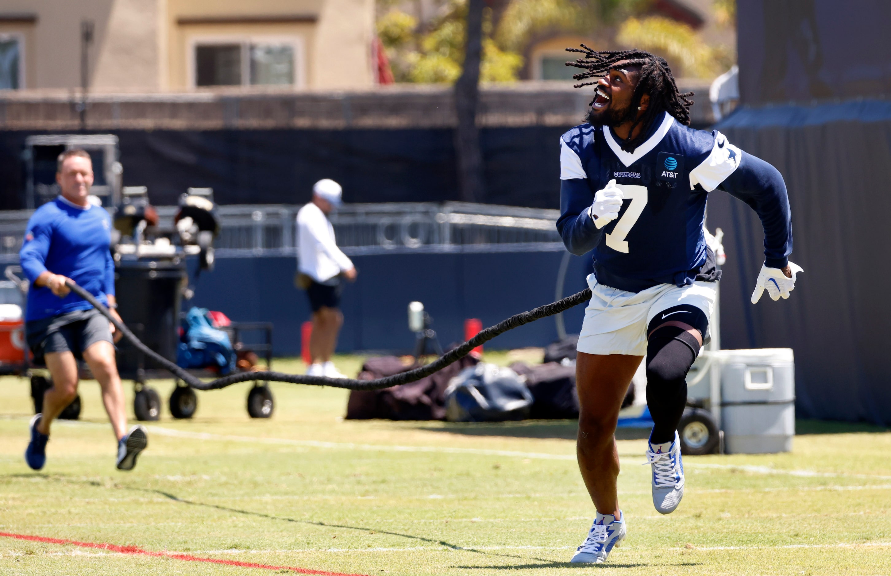 Dallas Cowboys cornerback Trevon Diggs (7) looks for thew ball thrown to him while being...