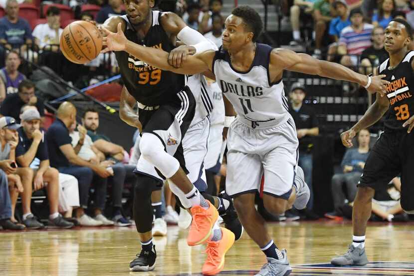 LAS VEGAS, NV - JULY 09:  Josh Jackson #99 of the Phoenix Suns and Yogi Ferrell #11 of the...