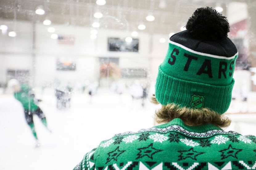 Fans watch a workout on the first day of Dallas Stars development camp at the Dr Pepper...
