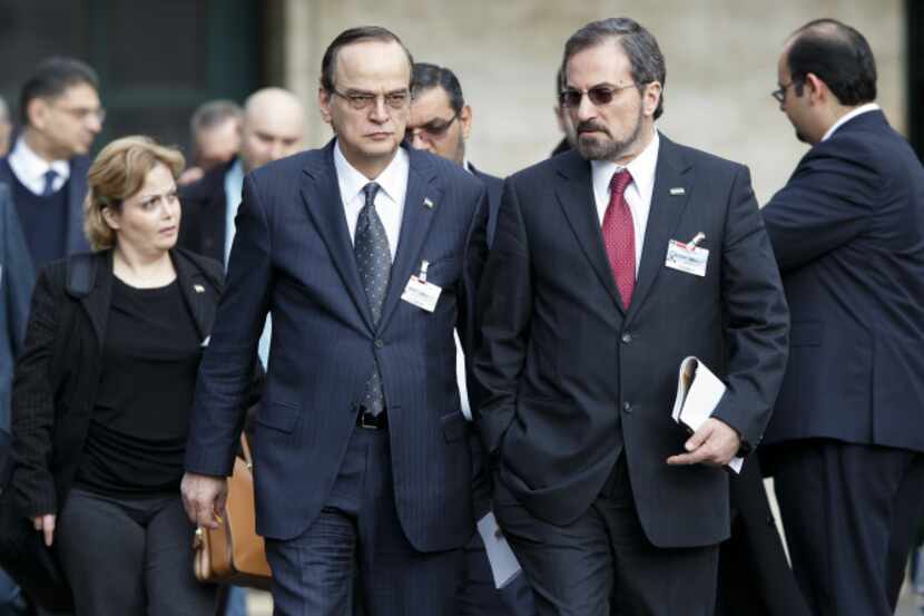 Syrian opposition chief negotiator Hadi  Bahra (center, left) and Louay Safi, spokesman for...