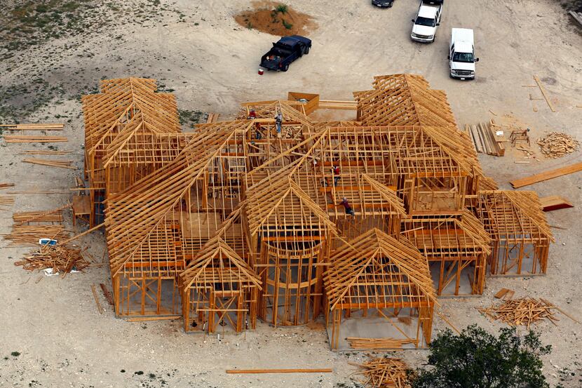 An aerial photograph of a new home under constructed in Cedar Hill, shot Thursday, August...
