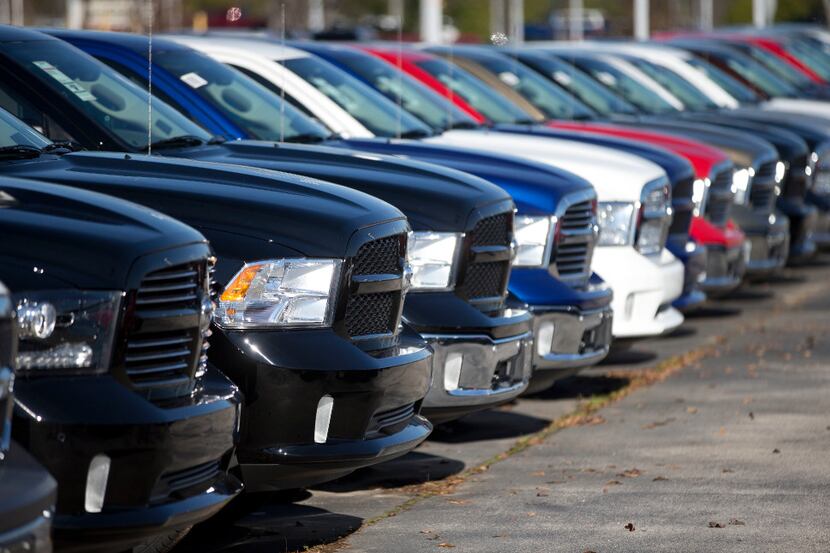 Ram pickup trucks are on display on the lot at Landmark Dodge Chrysler Jeep RAM in Morrow,...