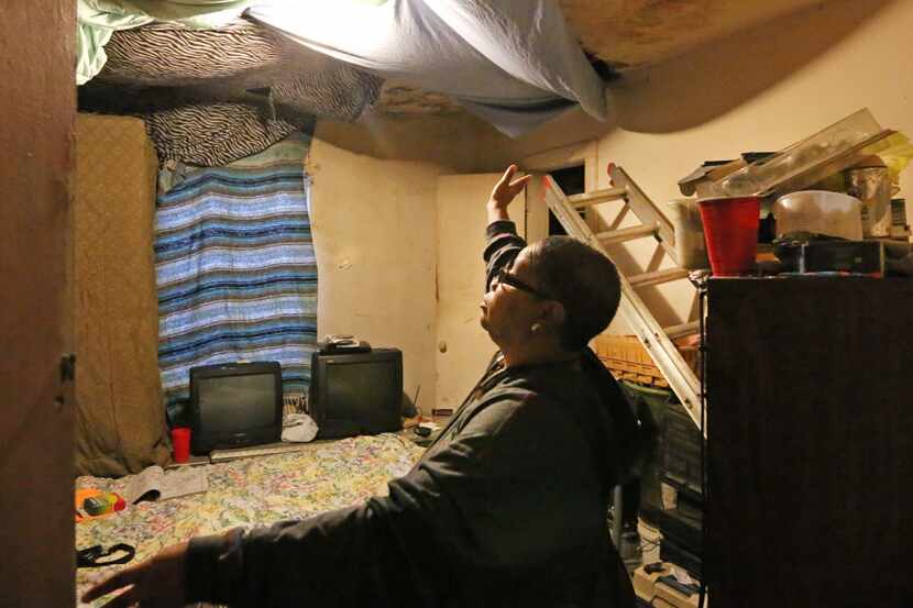  Joanne Bonner lives with a water-damaged ceiling in the home that she and her family rent...