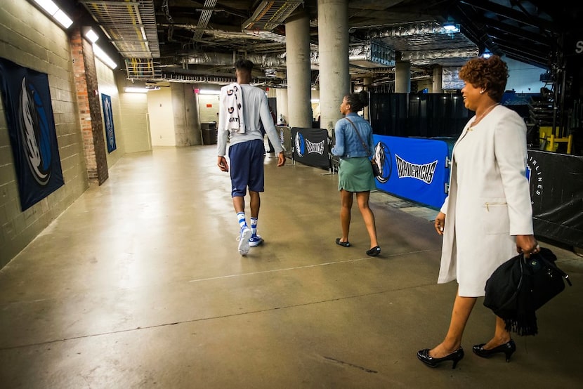 Dorcina Noel follows her son, Dallas Mavericks forward Nerlens Noel, and daughter Nashdah...