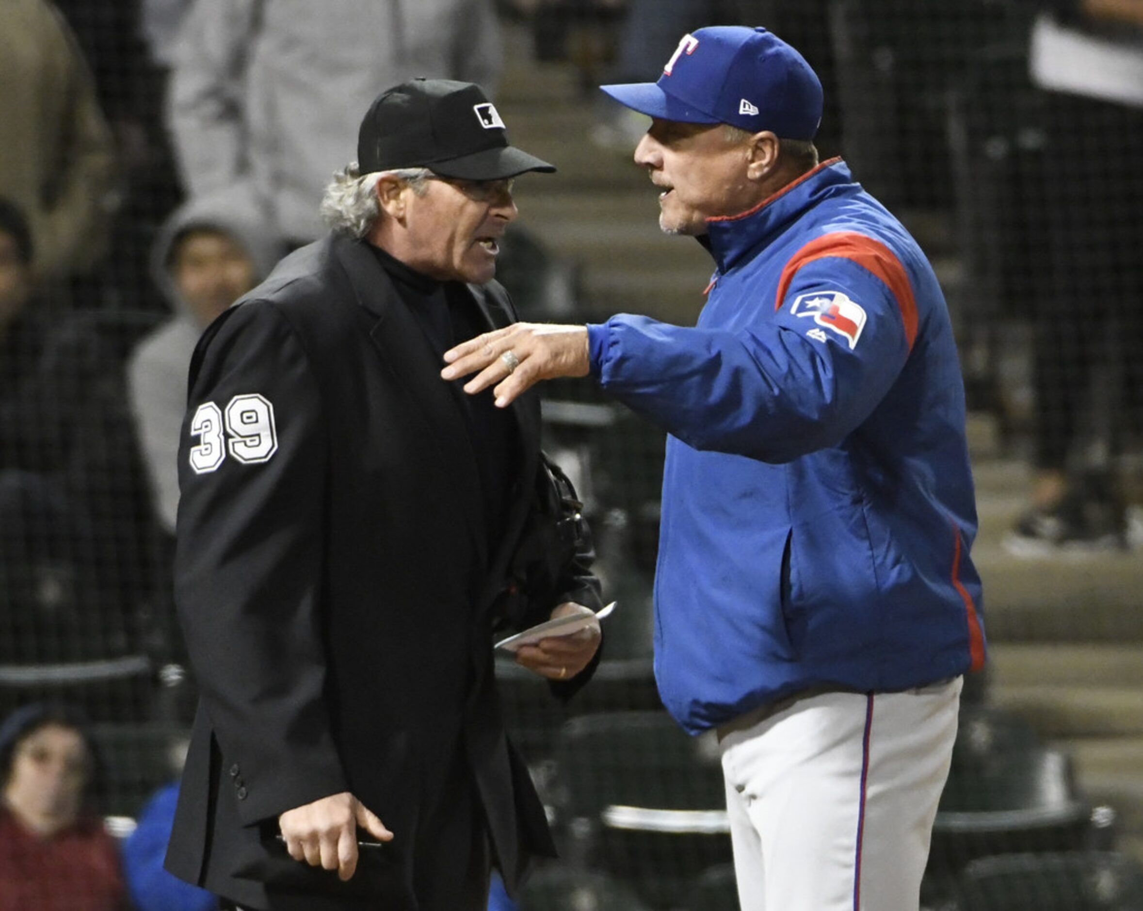 CHICAGO, IL - MAY 17: Jeff Banister #28 manager of the Texas Rangers argues a call with...