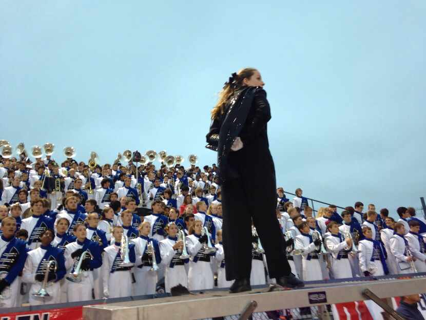 Kate Henderson , 17, of Allen, the head drum major for the Allen High School marching band,...