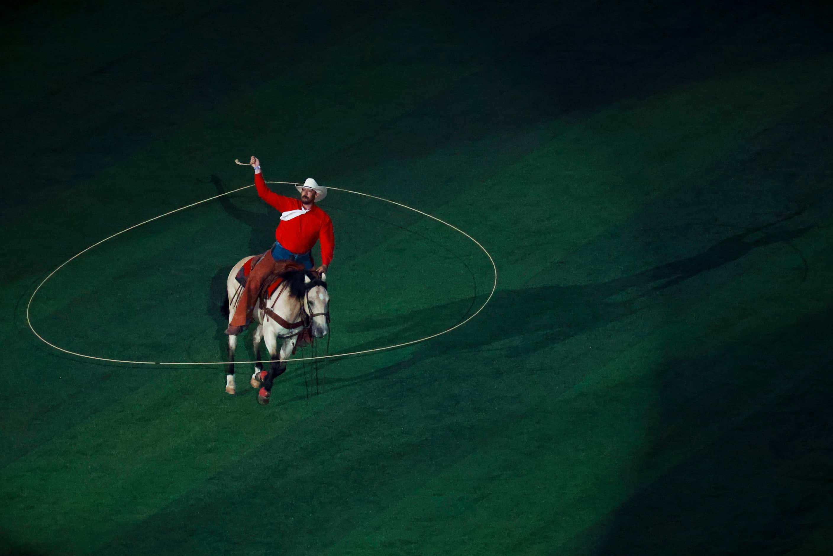 A horse rider performs during MLB All-Star baseball game opening ceremony, on Tuesday, July...