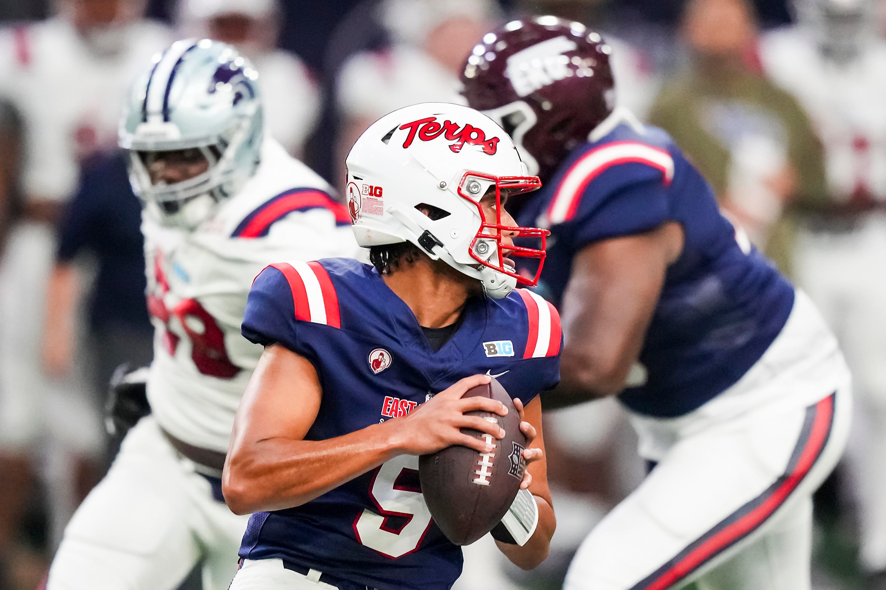 West quarterback Taulia Tagovailoa of Maryland  (5) looks to pass during the first half of...