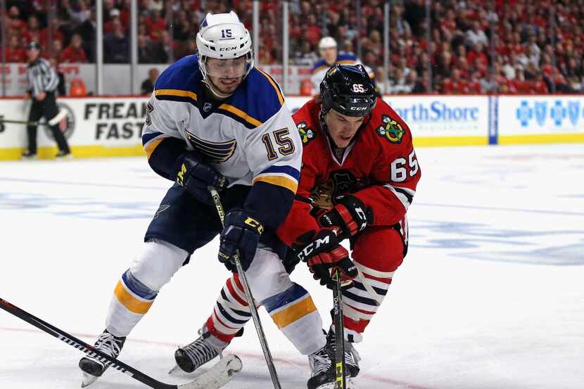 CHICAGO, IL - APRIL 17: Andrew Shaw #65 of the Chicago Blackhawks and Robby Fabbri #15 of...